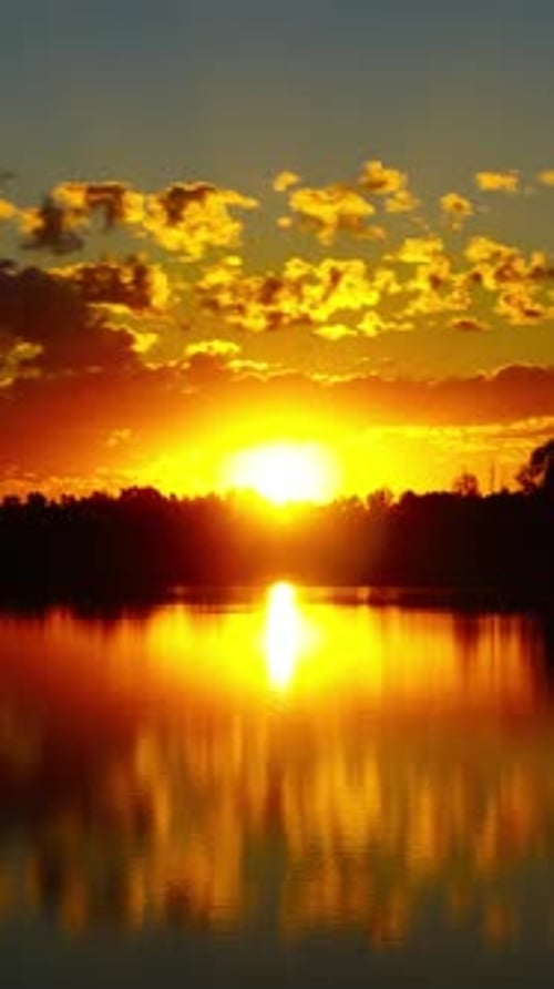 Landscape with sunrise over lake