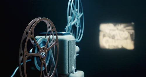 Vintage Film Projector in a Dark Room