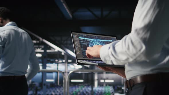 Close Up of IT Specialist in Server Room Doing AI Deep Learning ...