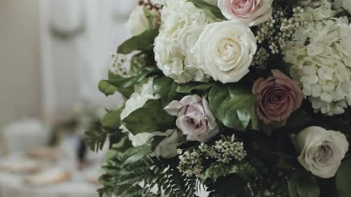 Elegant Wedding Flower Arrangement at Reception Venue