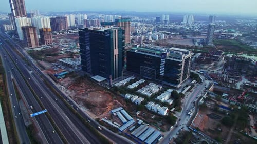 Gar infobahn buildings with hyderabad ORR and vehicles at nanakramguda, financial district, hyderaba