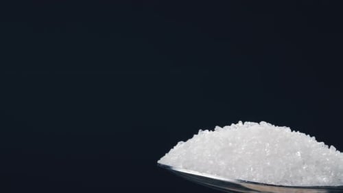 Closeup on a Blackblue Background White Crumbly Granulated Sugar Lies on It Crystal Sugar Spills