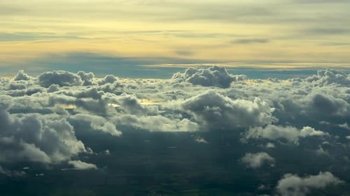 Stunning Cinematic Aerial View Flying Above White Puffy Cloud Formations