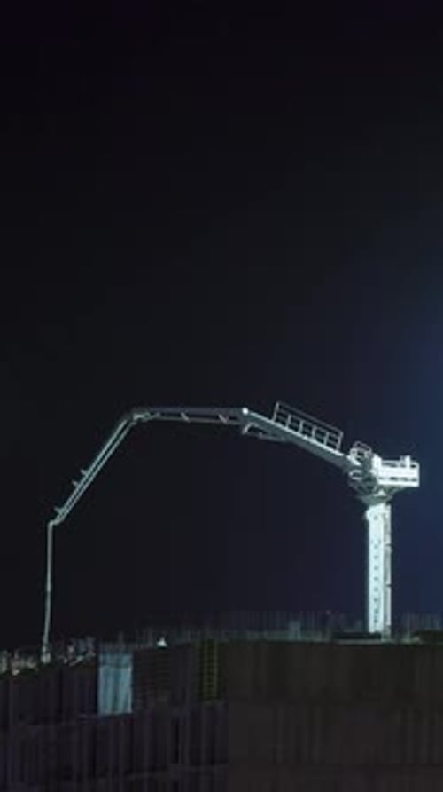 Illuminated Night Time Work Crane