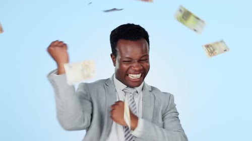 Money rain, winner or happy black man in studio with jackpot, competition giveaway or cash prize