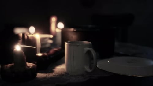 Rustic Table Setting with Flickering Candlelight