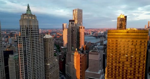 Lower Manhattan at sunset, New York City, USA (aerial view)