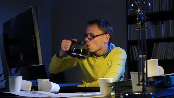 Overworked Man Drinking Coffee in Night Office, Business, Corporate ...