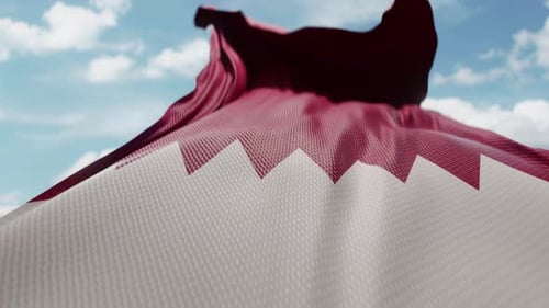 Realistic Qatar Flag Waving in Blue Sky