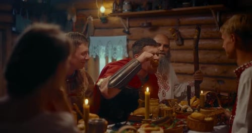 Man Eating Red Caviar in Old Wooden House in Ancient Slavic Village Russian Cuisine Prores
