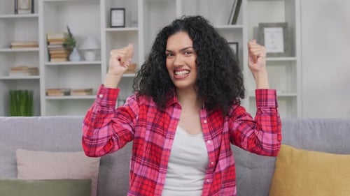 Happy Lady Making Winner Gestures After Receiving Great News