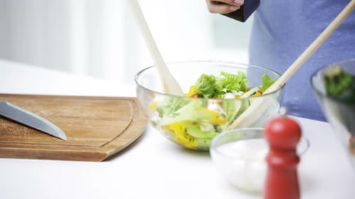 Healthy Eating, Vegetarian Food, Cooking, Dieting and People Concept - Close Up
