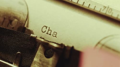 Typing Chapter One on Paper with Typewriter