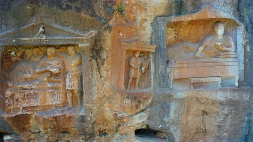 Ancient Rock Reliefs Featuring Reclining Figures