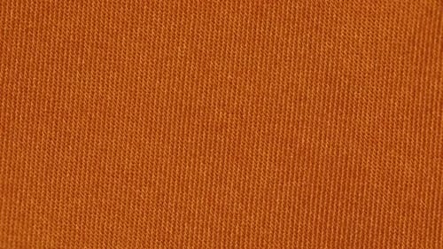 Tangerine Color Plain Textured Fabric. - Closeup Shot
