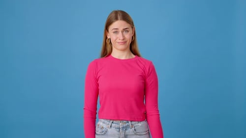 Young Woman Gives Double Thumbs Down