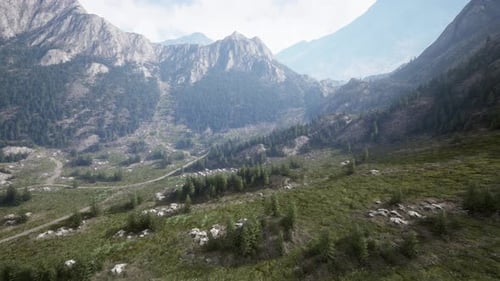Breathtaking Aerial View of a Majestic Valley Nestled Between Towering Mountains