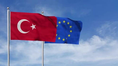 Realistic Turkey and European Union Flags Waving Against Blue Sky