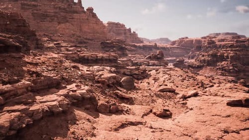 Vivid and Detailed View of Rugged Canyon Featuring Bright Sky and Sharp Rocks