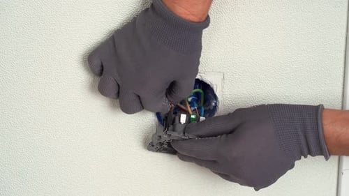 Electrician Hands Install Electrical Socket Replacing Electrical Outlet Installing