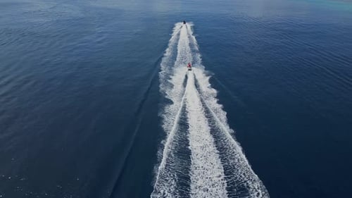 Aerial View of Two Water Scooters in the Blue Sea