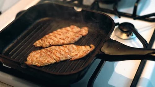 Chicken Cooking in Grill Pan at Home Kitchen