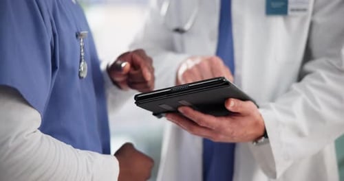 Tablet, hands or doctors planning in hospital with medical staff for schedule