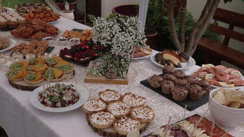 Elegant outdoor buffet with assorted gourmet dishes