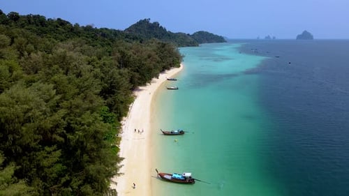 Discovering the Idyllic Beauty of Koh Kradan Thailand with Its Stunning Beaches and Boats