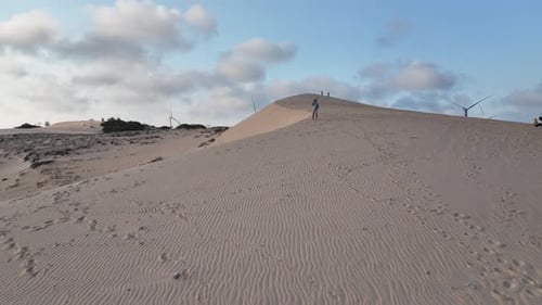 Desert Dunes Landscape with Person Walking