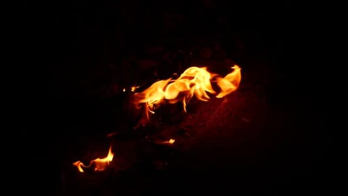 Glowing Fire Flames Burning in the Darkness