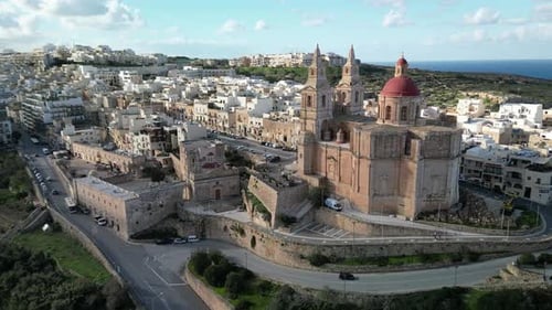 Drone Video Panning Left Around the Parish Church of Mellieha in Malta