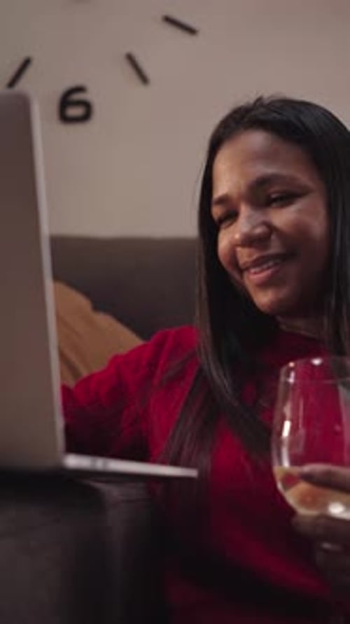 Closeup of African American Woman at Home Using Laptop to Communicate Online
