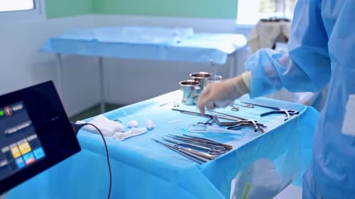 Surgery instruments. Medical team performing operation.