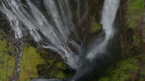 Aerial view of a beautiful waterfall in highlands region of Iceland.