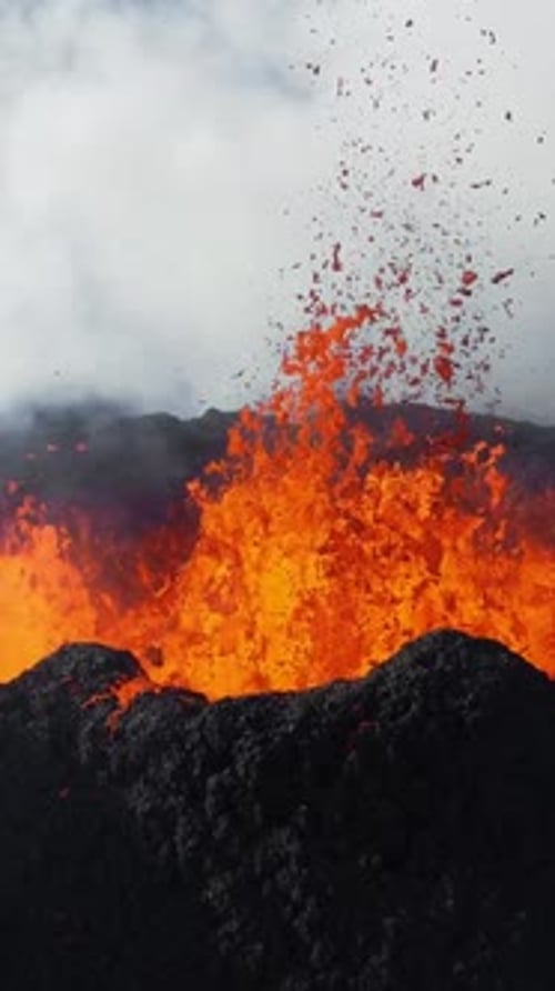 Vertical Screen Volcano Eruption Flowing Red Hot Lava Erupts From Crater Incredible Natural