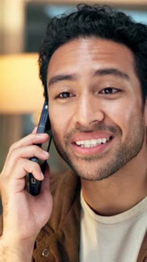Man, phone call and smile in office at night for discussion, feedback and review article
