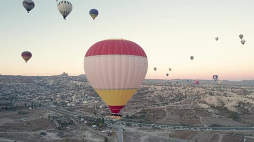 Aerial View of Hot Air Balloons at Sunset