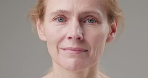 Close-Up Portrait of a Serene Woman's Face