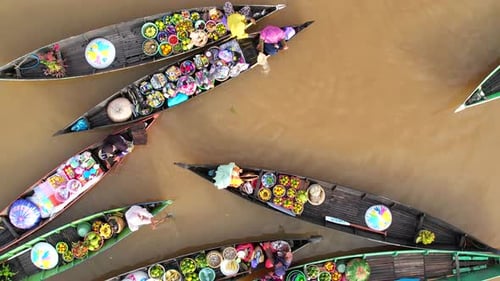 Traditional traders at Lok Baintan floating market selling local produce on the Martapura river.