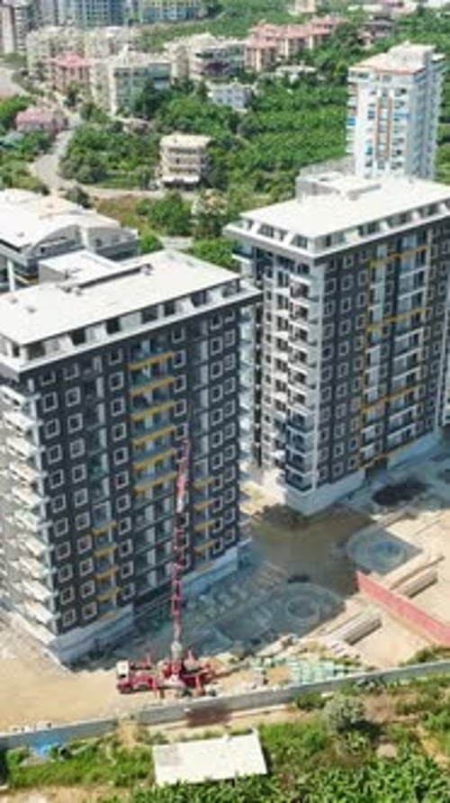 Vertical Video Vertical Progress Facade Work and Material Transfer in a MultiStory Building