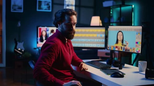 Focused Video Editor Working Late in Home Office