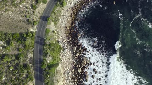 Dramatic Aerial View of Coastline Road and Ocean