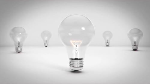 Exploding Energy Light Bulb On White Background