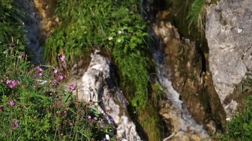 Small River going down rocks in Slowmotion
