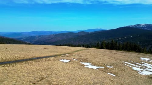 Landscape of Rysianka mountain pasture hillside - drone 4K