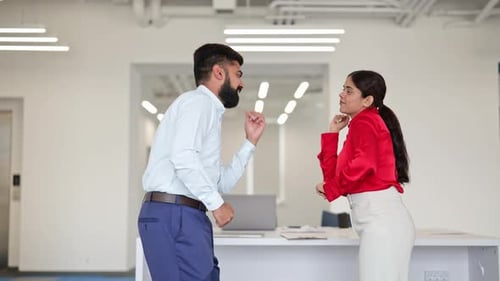 Cheerful Indian Coworkers Dancing in Office
