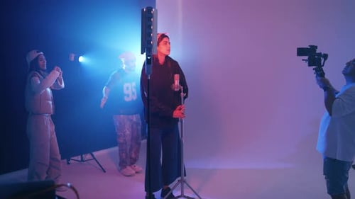 Female Singer Performing in a Music Video Production Studio