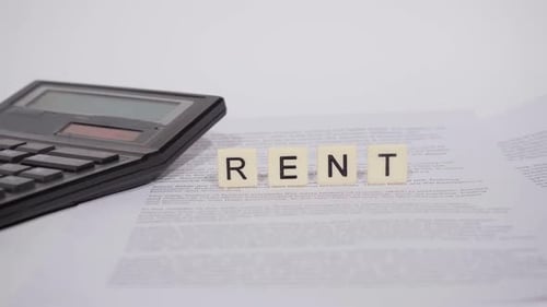 Calculator and Word Rent on Financial Documents