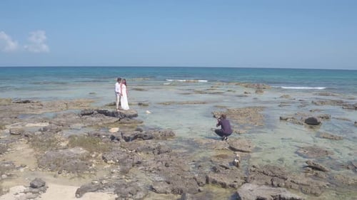 Wedding photographer captures newlyweds romantic beach photo shoot in Mexico